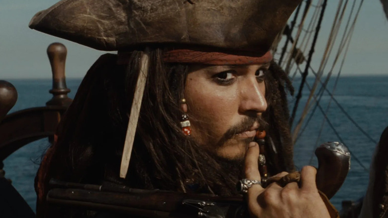 Jack Sparrow holding a gun