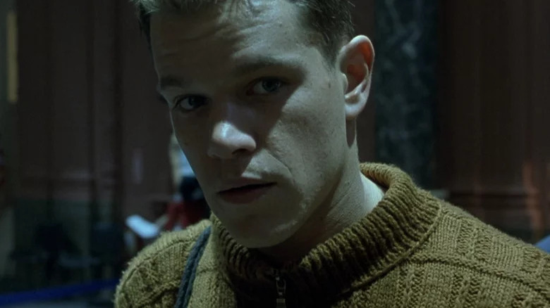 Jason Bourne wearing a sweater