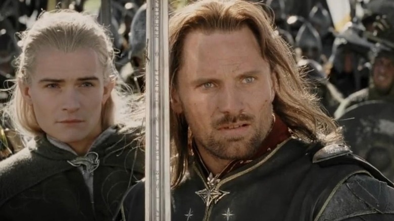 Aragorn fighting alongside Legolas