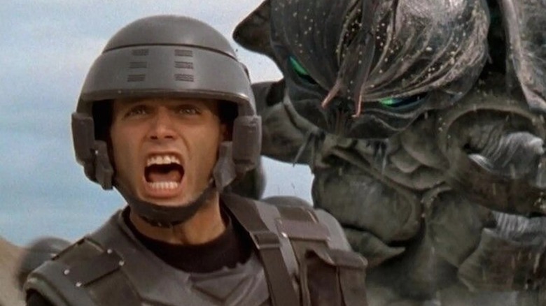 Alien attacking soldier