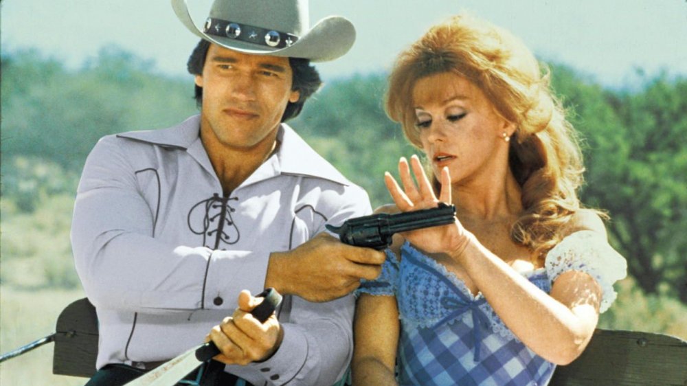 Arnold Schwarzenegger and Ann-Margret in The Villain