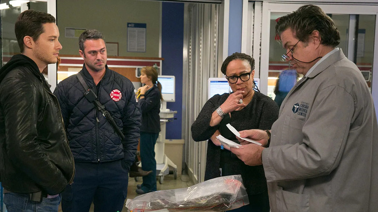 Halstead, Severide, Charles, Goodwin stare