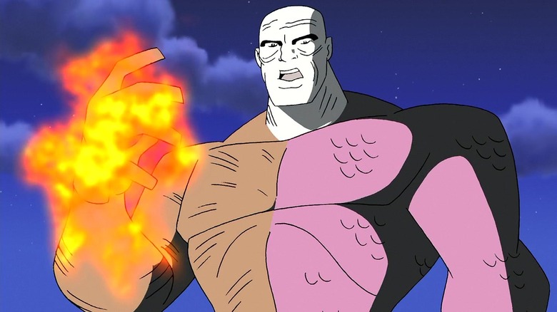 Metamorpho surrounds hand in fire