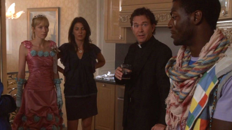 The cast of Leverage stands in wedding attire