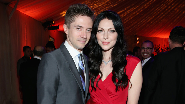 Topher Grace and Laura Prepon