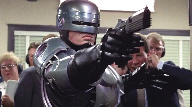 RoboCop raises gun