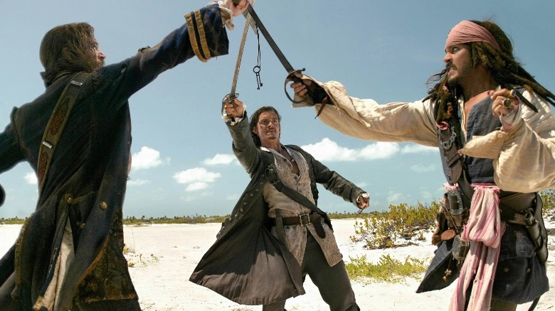 Will Turner, James Norrington, and Captain Jack fighting