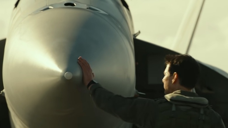 Maverick caressing plane