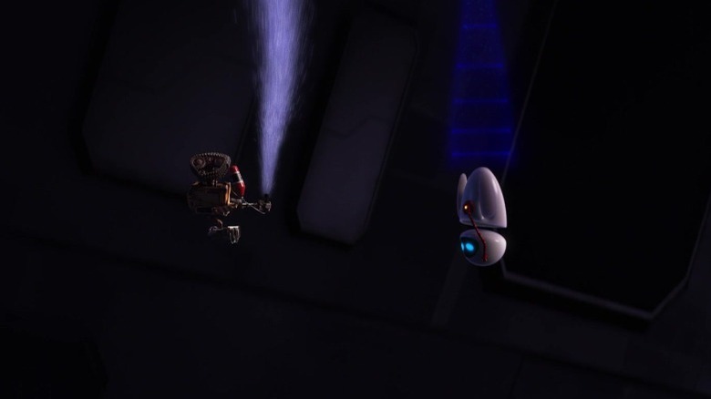 Wall.E and EVE soaring through space