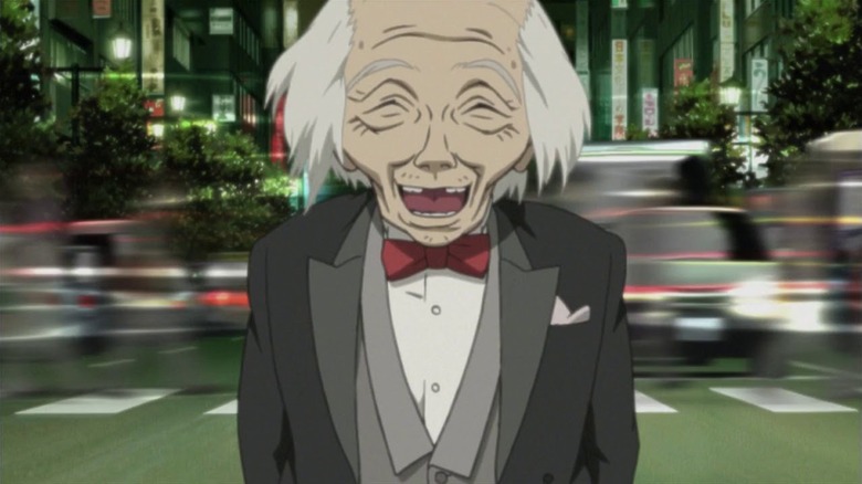 Old man in tuxedo laughing