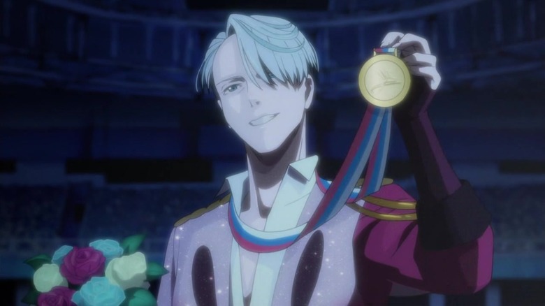 Victor Nikiforov lifts gold medal