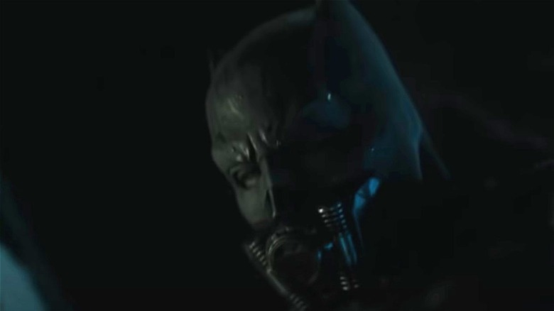 Batman wearing a rebreather