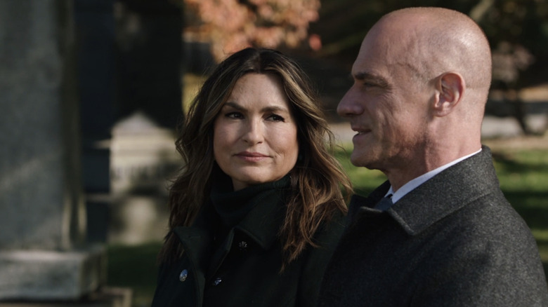 Stabler and Benson at graveside talking