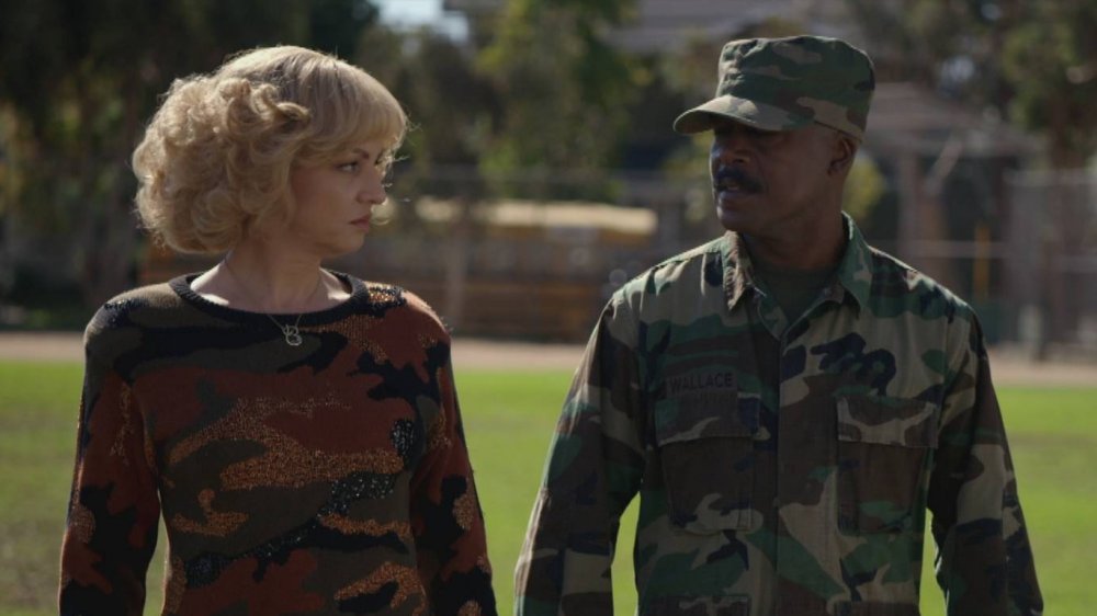 Wendi McLendon-Covey as Beverly and Marlon Young as Captain Wallace in The Goldbergs