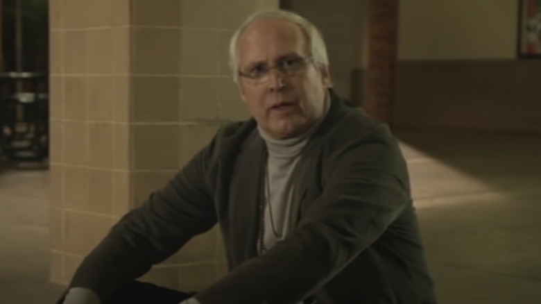 Chevy Chase sitting on steps Community blooper