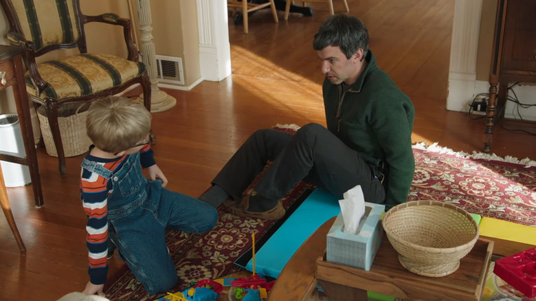 Nathan Fielder with child