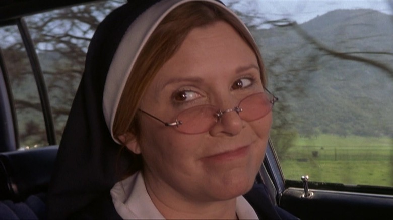 Carrie Fisher smiling as nun