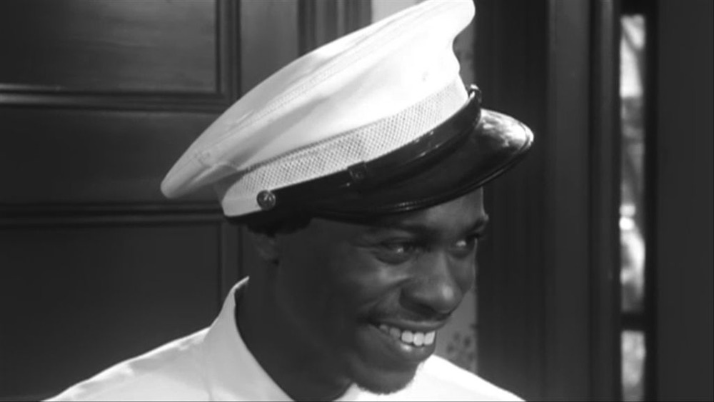 Dave Chappelle dressed as a milkman