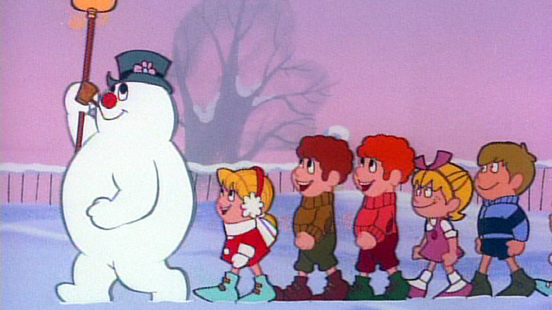 Frosty leading children on a parade