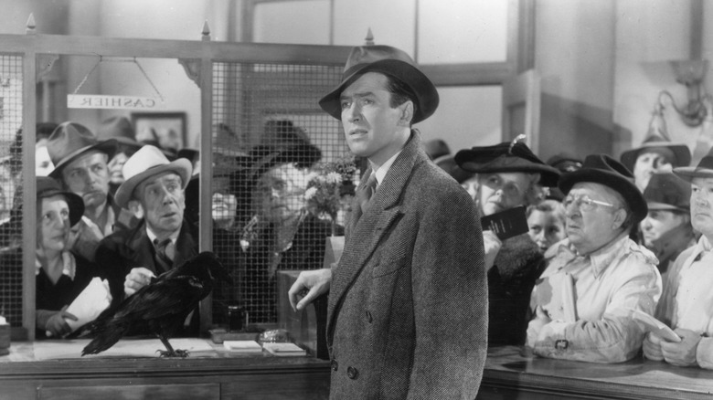 George Bailey with hat and coat