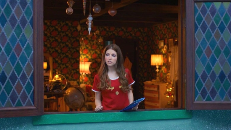 Anna Kendrick as Noelle Kringle looking out a window in Noelle (2019)