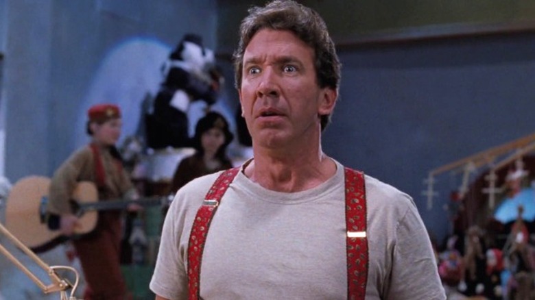 Tim Allen as Scott Calvin staring in shock in the North Pole Christmas headquarters in The Santa Clause (1994)