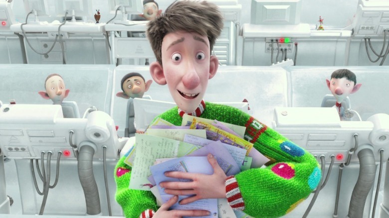 Arthur Christmas holds letters