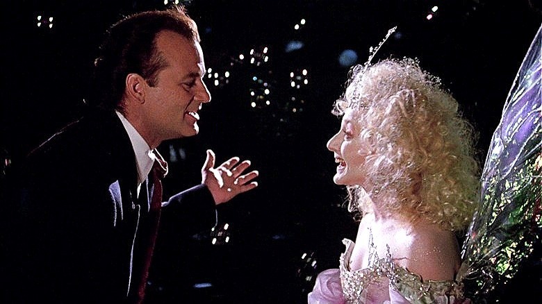 Scrooged Frank yells at the Ghost of Christmas Present