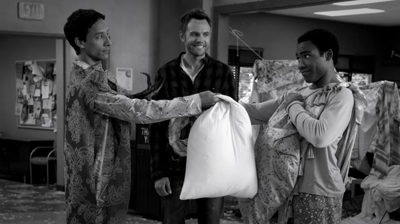 Troy Barnes and Abed Nadir shake hands