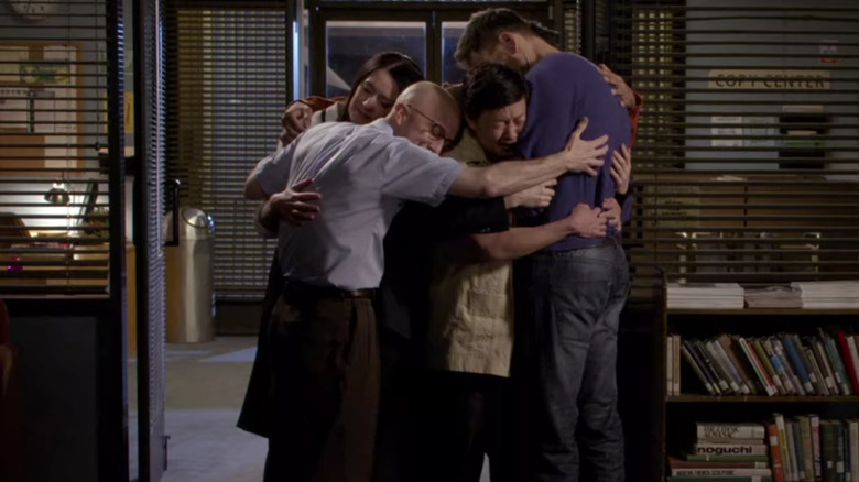 Community cast shares group hug