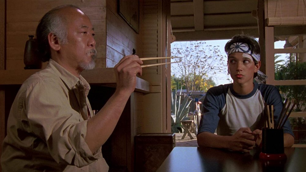 Pat Morita and Ralph Macchio in The Karate Kid