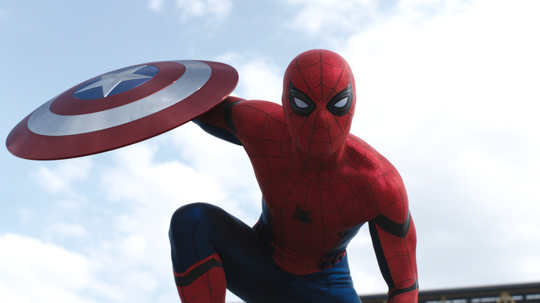 Spiderman holding the shield Captain America: Civil War