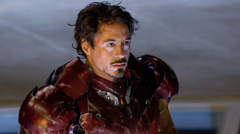 Tony wears his Iron Man suit