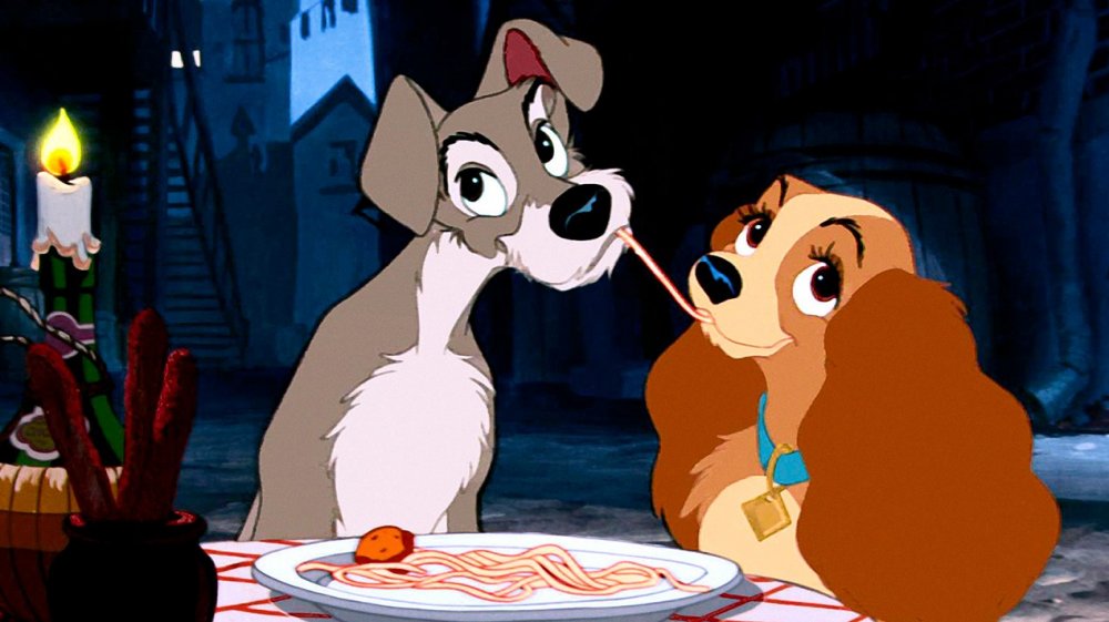 Tramp and Lady share spaghetti in Lady and the Tramp