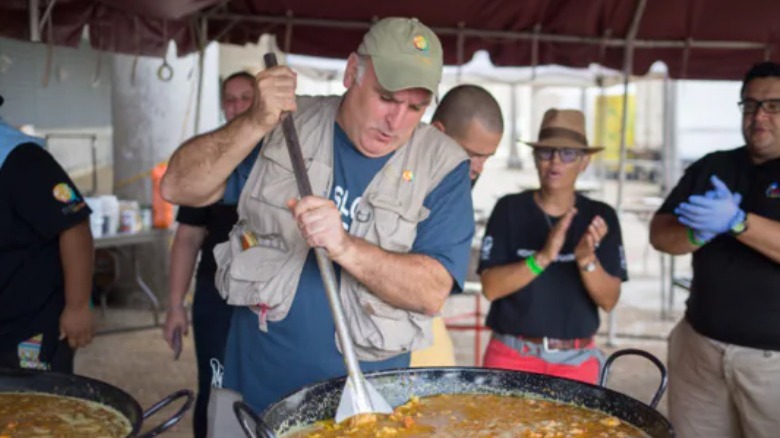 José Andrés preparing a large meal