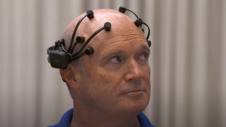 Men with electrodes on head