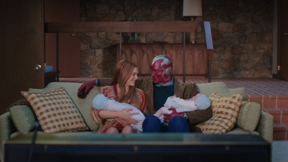 Wanda and Vision holding babies