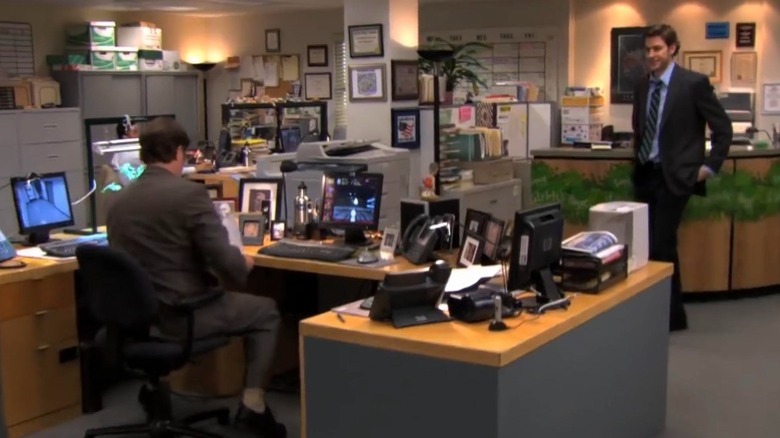 Dwight sitting at megadesk