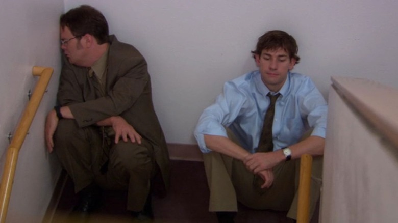 Crying Dwight and Jim in stairwell