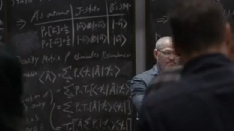 Dr. Bill Foster and chalkboard