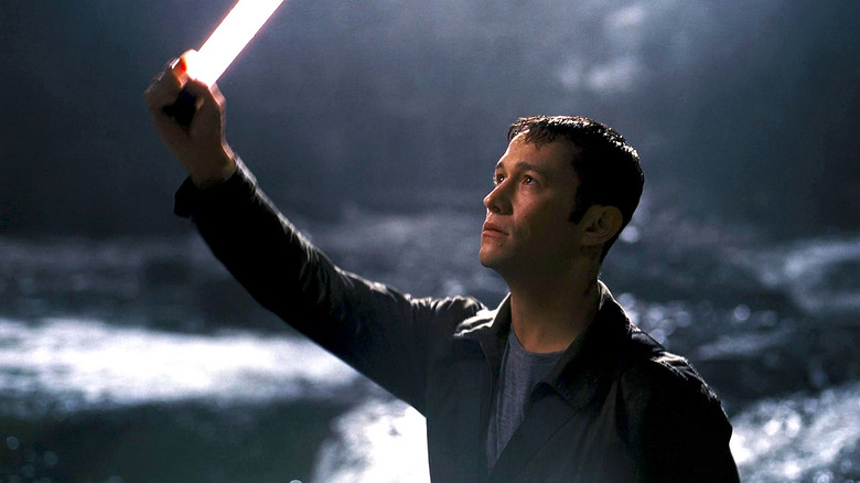 Joseph Gordon Levitt holding light