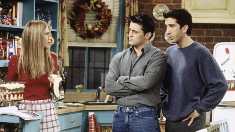 Joey and Chandler looking at Rachel