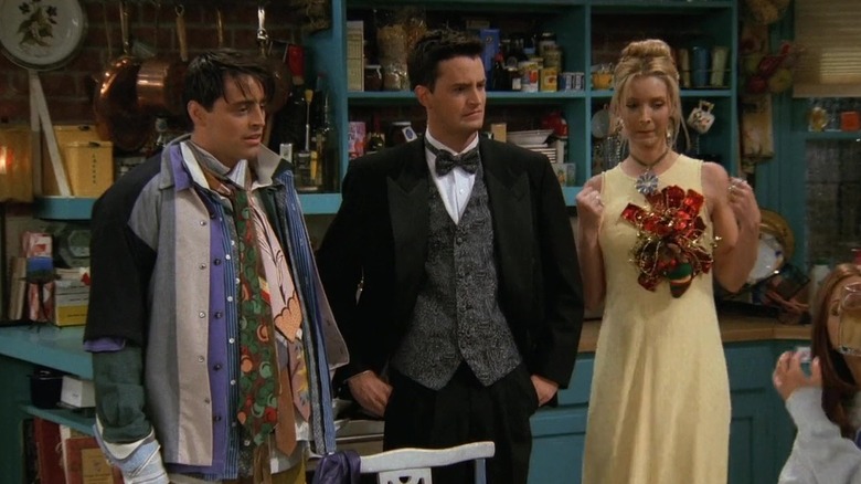 Phoebe, Joey, and Chandler dressed up