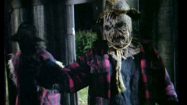 Scarecrow walking at midnight