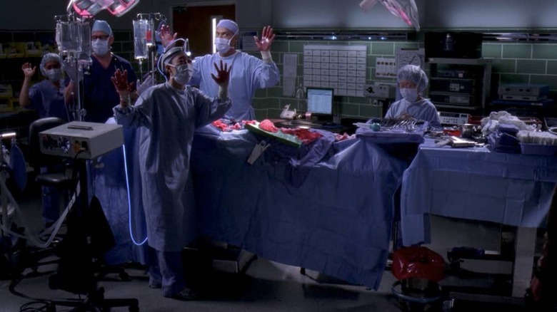 Surgeons hold up hands in O.R.