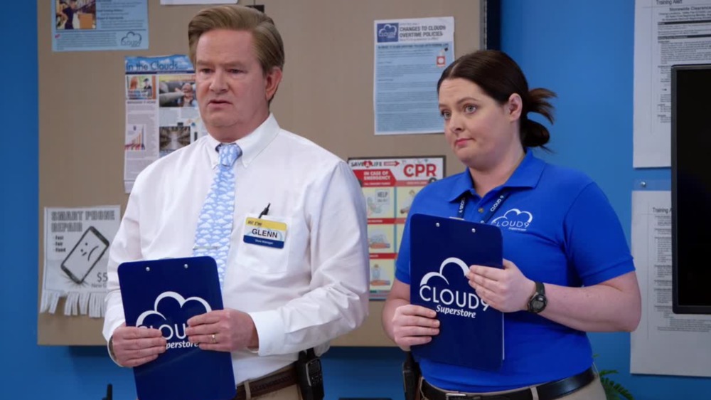 Superstore Glenn and Dina stand with clipboards