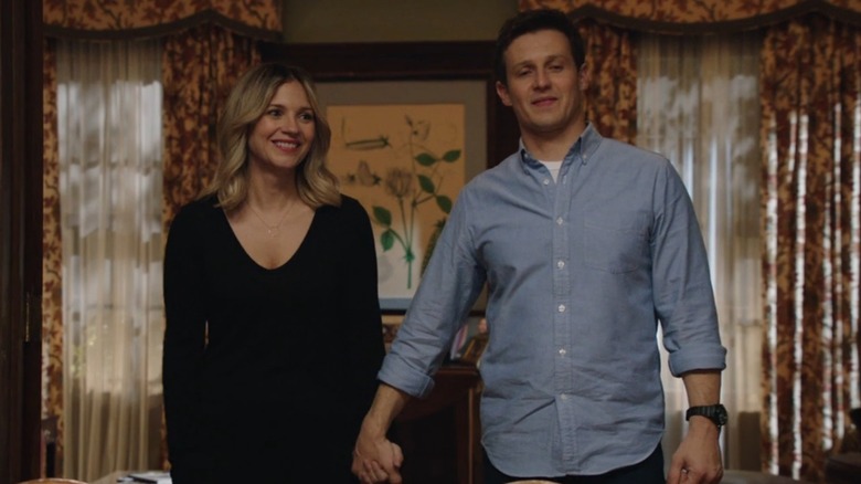 Will Estes and Vanessa Ray holding hands smiling