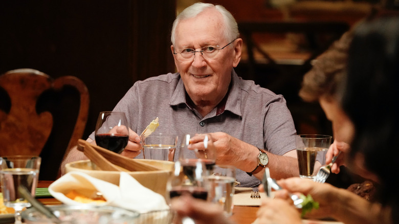 Henry Reagan smiling at family dinner