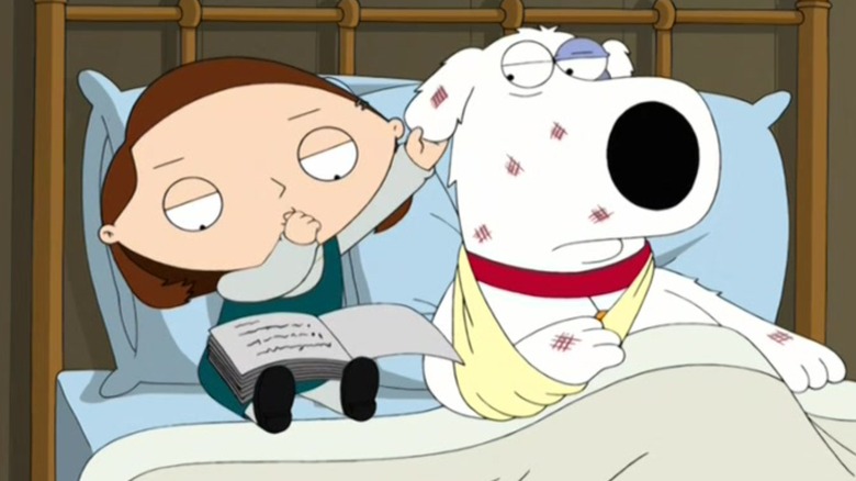 Stewie sitting with Brian