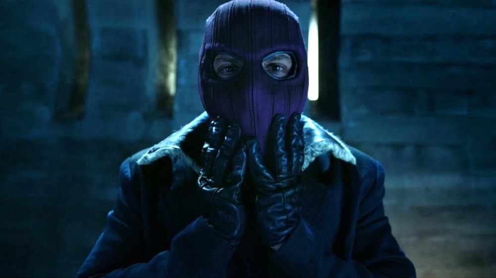 Zemo donning his mask